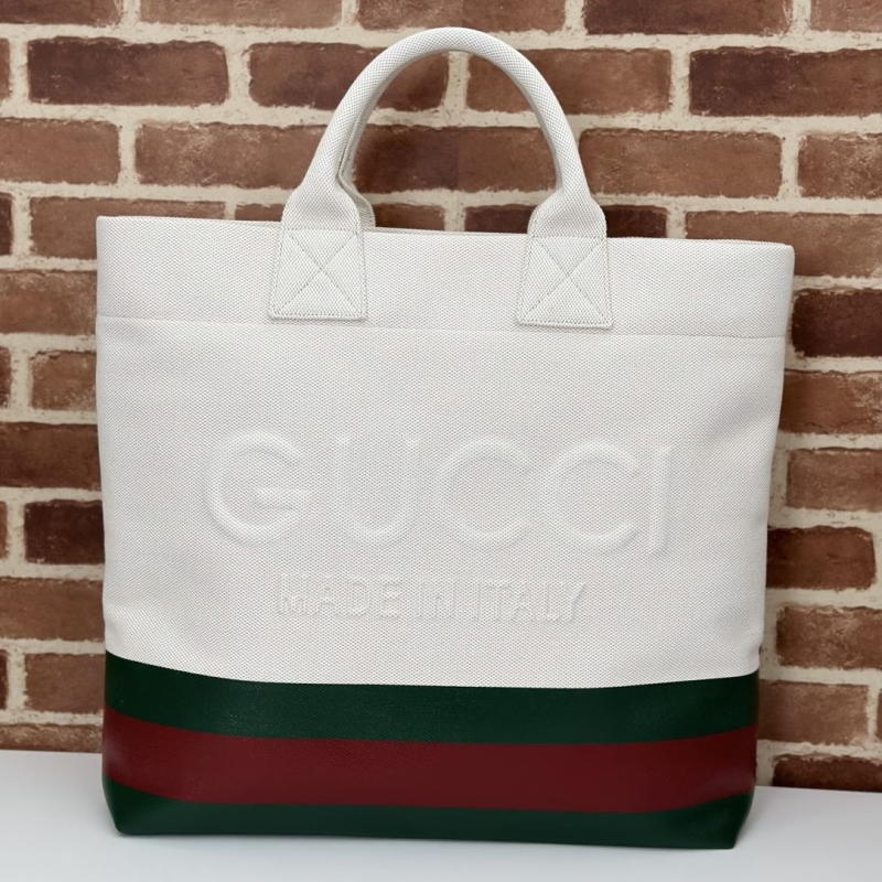 G*u*i shopping bags